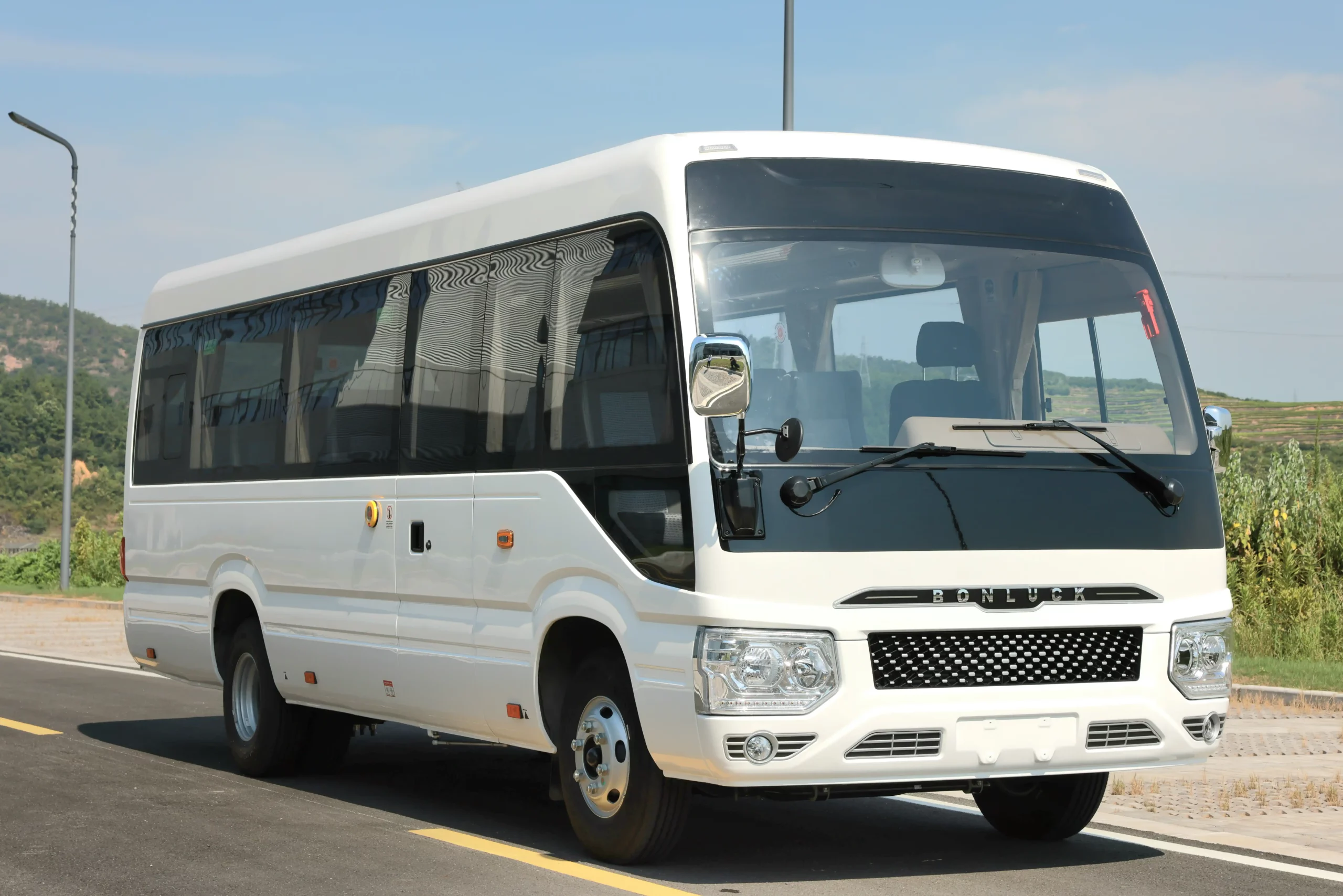 Commercial buses and coaster vans for workforce transportation